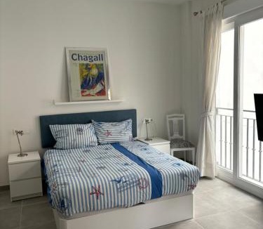 La Victoria Apartment | Central Studio with Shared Rooftop Terrace