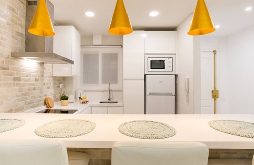 La Victoria Apartment | Charming Historic Apartment in Malaga with Balconies and Rooftop Pool