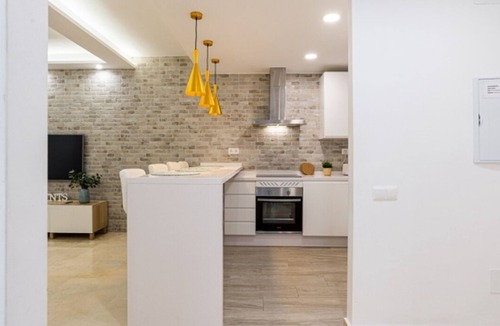 La Victoria Apartment | Charming Historic Apartment in Malaga with Balconies and Rooftop Pool
