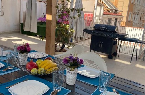 La Cala del Moral Villa | Cheerful five bedroom villa with a hot tub &cinema