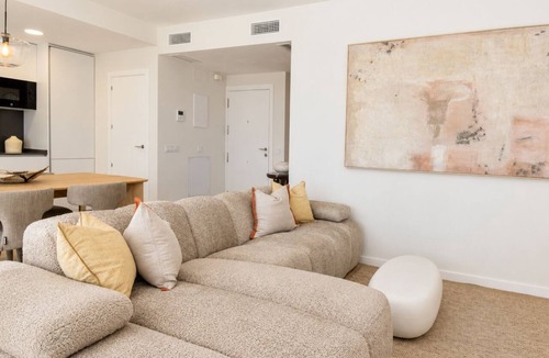 Rincon de la Victoria Apartment | Contemporary Coastal Apartment with Three Bedrooms, Shared Pool & Gym