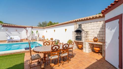 Penaflor Villa | Cortijo Los Mellizos Penaflor by Ruralidays