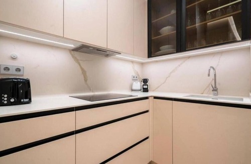 La Serna del Monte Apartment | Elegant Malasaña Retreat with Balconies Near Gran Vía