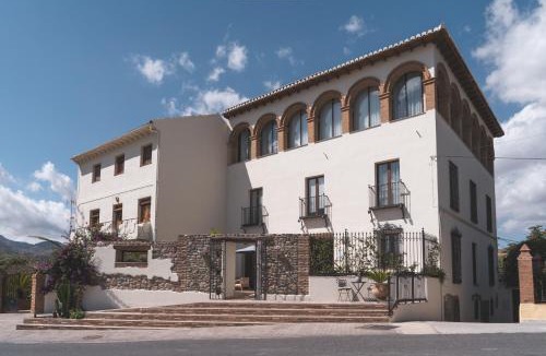 Melegis Hotel | Elysium Luxury Stays