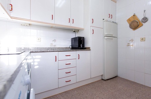 Isla Plana Apartment | Enjoy a relaxing vacation by the sea in this vacation apartment with a beautiful conservatory.
