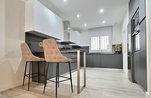San Roque House | Experience sophistication in this contemporary four-bedroom frontline golf townhouse