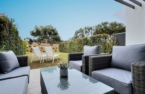 San Roque House | Experience sophistication in this contemporary four-bedroom frontline golf townhouse