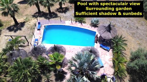 Alozaina Apartment | Ground floor apartment "CEZANNE", with spectacular pool in rural holiday park FINCA EL MORALEJO