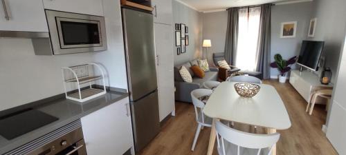 Distrito Centro Apartment | GRUPO LIMCOTEL PERLAS dE LA AXERQUIA