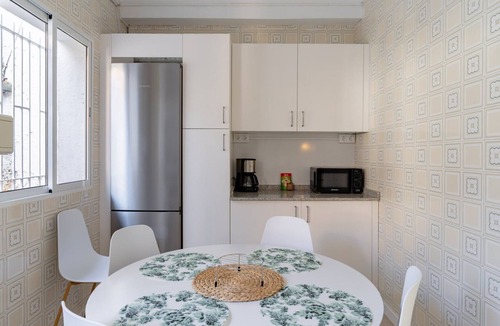 Playas del Palo Apartment | GuestReady - Terrace Malaga view
