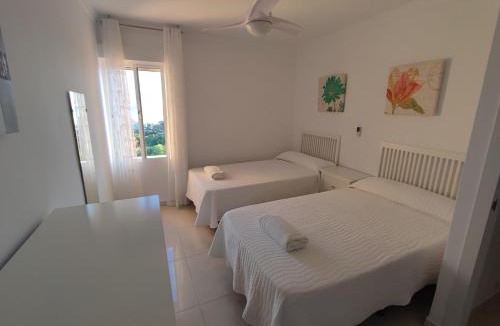Benalmadena Costa Apartment | Hercules Paradise 531 - Mediterranean Sea View Terrace - Resort Pools & Gardens - 10 Min Beach - Central Benalmadena - Direct Train to Airport & Malaga - Fast Private WiFi - Remote Work and FireTV ready