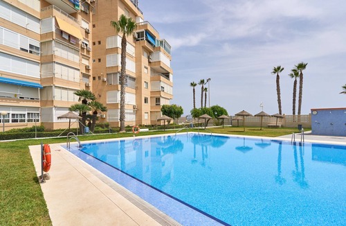Mezquitilla Apartment | Holiday Home 'Algarrobo Costa Studio Sun-sat' with Shared Pool, Shared Garden and Air Conditioning