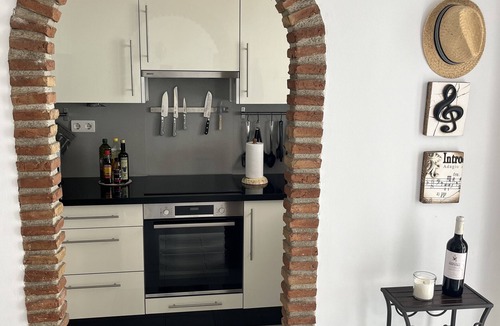 Urbanizacion Ladera del Mar House | Holiday Home 'Casa Ladera Del Mar' with Sea View, Wi-Fi and Air Conditioning