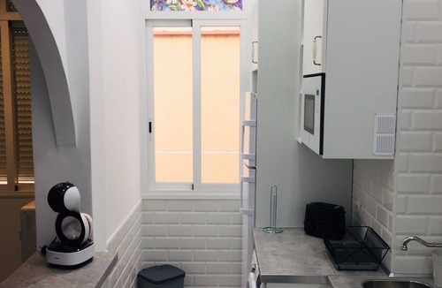 El Molinillo House | Holiday Home 'The Loft Malaga Center' with Balcony, Wi-Fi and Air Conditioning