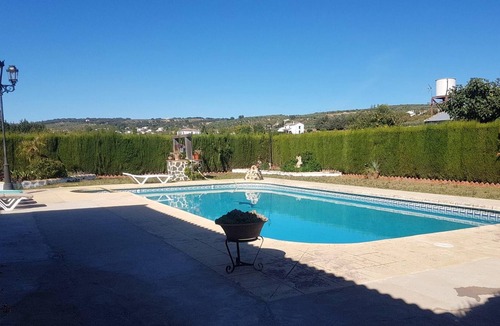 Arriate House | Homerez - House for 8 ppl. with swimming-pool, garden and terrace at Arriate