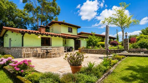 Llamigo Ski Chalet | La Braña en Llanes · Jardín, Playa y Senderismo
