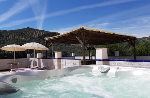 Iznajar Apartment | Luxury Roof Terrace Apartment With Amazing Views, a chlorine free Pool/hot tub
