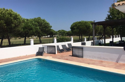 El Portil Villa | Luxury villa with private pool overlooking golf course, close to beach