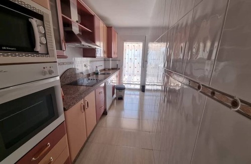 Nuevo Portil Apartment | Magnificent apartment with a spectacular terrace 5 minutes from the beach.