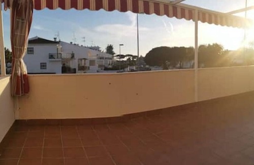 Nuevo Portil Apartment | Magnificent apartment with a spectacular terrace 5 minutes from the beach.