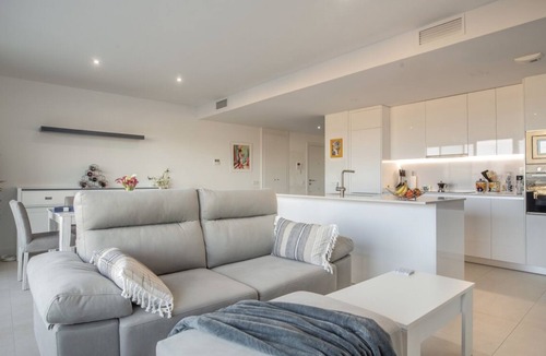 Estepona Condo | Modern 3 bedroom penthouse with mountain and sea views.