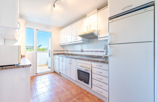 La Cala de Mijas Apartment | Modern Apartment 'In Jardin Botanico' with Sea View, Pool, Wi-Fi, Garden & Terrace