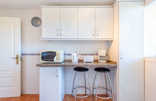 La Cala de Mijas Apartment | Modern Apartment 'In Jardin Botanico' with Sea View, Pool, Wi-Fi, Garden & Terrace