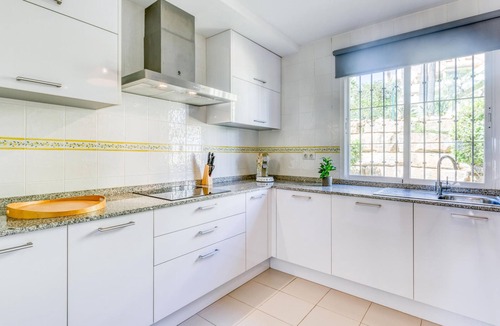 Estepona Apartment | Modern comfort in Estepona: terrace, pools, AC, and Wi-Fi