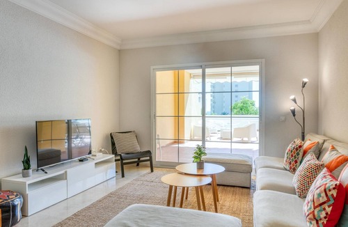 Estepona Apartment | Modern comfort in Estepona: terrace, pools, AC, and Wi-Fi