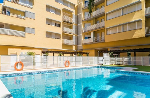 Isla Cristina Apartment | Nice apartment for 5 guests with pool, A/C, WIFI, TV and balcony