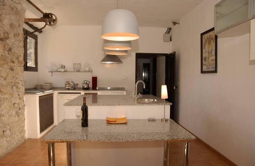 Montefrio House | Old mill, restored in a contemporary rustic style