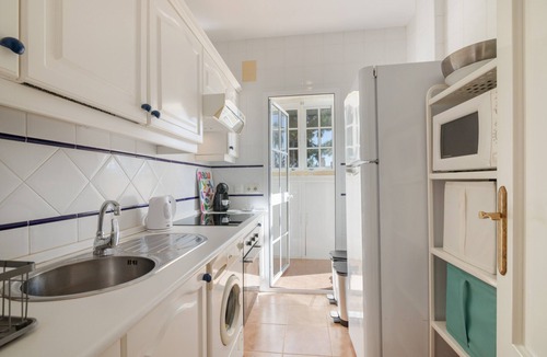 Islantilla House | Penthouse in Islantilla with Shared Pool, Wi-Fi, and Air Conditioning