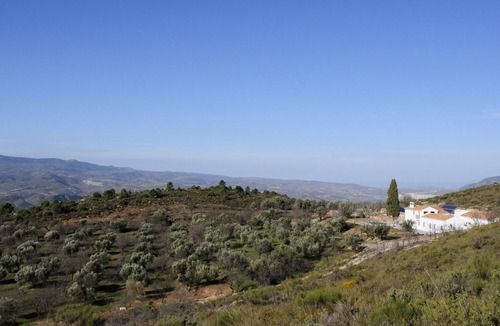 Lecrin Bed & Breakfast | Queen size bed room in vegetarian B&B within Sierra Nevada Natural Park