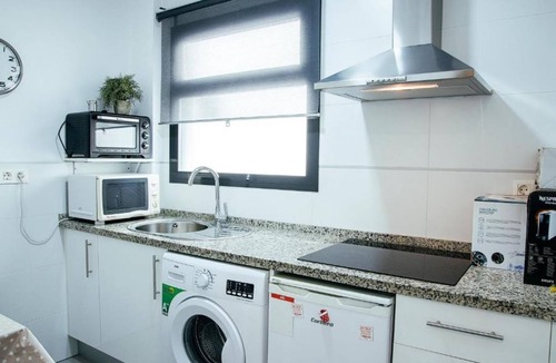 Los Remedios Apartment | RentalSevilla Walking through the Remedies