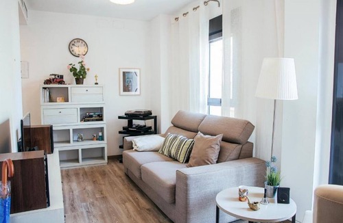 Los Remedios Apartment | RentalSevilla Walking through the Remedies