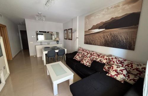 Roquetas de Mar Apartment | Romanilla Suites con vistas al mar, piscina y salida directa a la playa