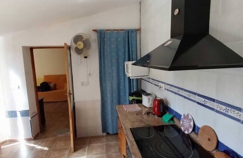 La Nora House | Room with pool and patio in a shared house