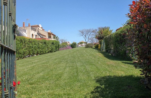 Costa Esuri Ski Chalet | ROU002 Townhouse with Private Garden and Direct Access to the Pool