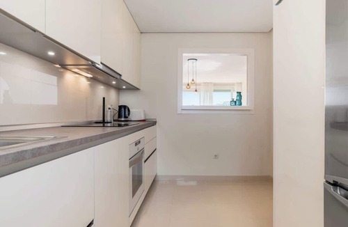 Casares Apartment | Scenic apartment in Alcazaba Lagoon with pools