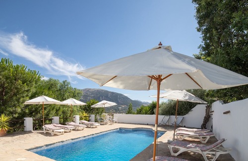 Villanueva del Trabuco Apartment | Secret garden rock pool retreat vacation home with shared pool and WiFi
