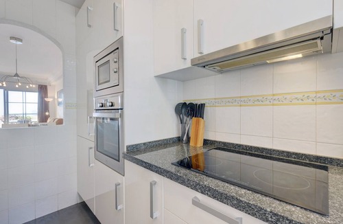 Estepona Apartment | Spacious Holiday Apartment 'Puerto Alto' with Sea Views, Shared Pool & Wi-Fi