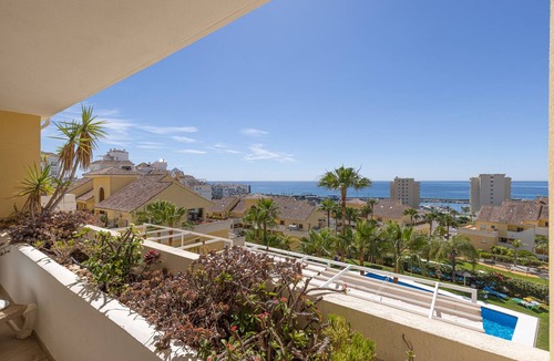 Estepona Apartment | Spacious Holiday Apartment 'Puerto Alto' with Sea Views, Shared Pool & Wi-Fi
