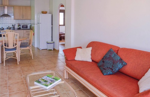 Isla Plana House | This cozy vacation terraced house with terrace is located only 650 meters from the pebble beach and