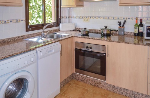 Isla Plana House | This cozy vacation terraced house with terrace is located only 650 meters from the pebble beach and