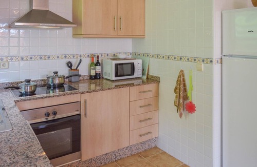 Isla Plana House | This cozy vacation terraced house with terrace is located only 650 meters from the pebble beach and