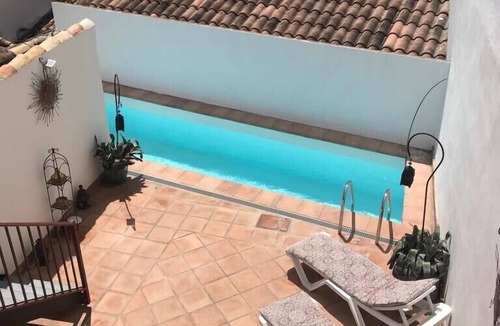 Algodonales House | Two big houses with pool nestled into foot of the mountain
