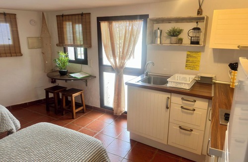 Velez-Malaga Apartment | Viñuela Hideaway - Your Mountain Studio with Kitchen & Pool
