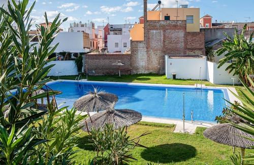 La Algaba Apartment | Welcome to this apartment with shared pool outside Seville.