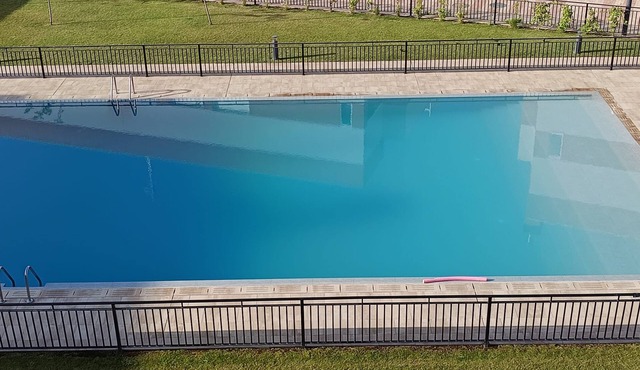 3-bedroom apartment with a 100-meter patio featuring a barbecue and a pool