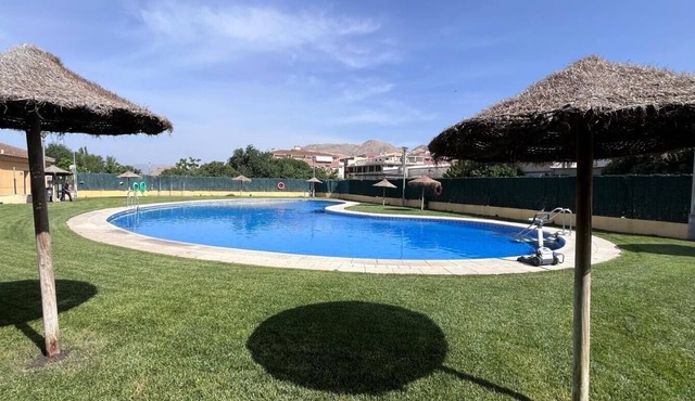 'Ágora Alhambra' Apartment with Mountain Views, Shared Pool, and Air Conditioning